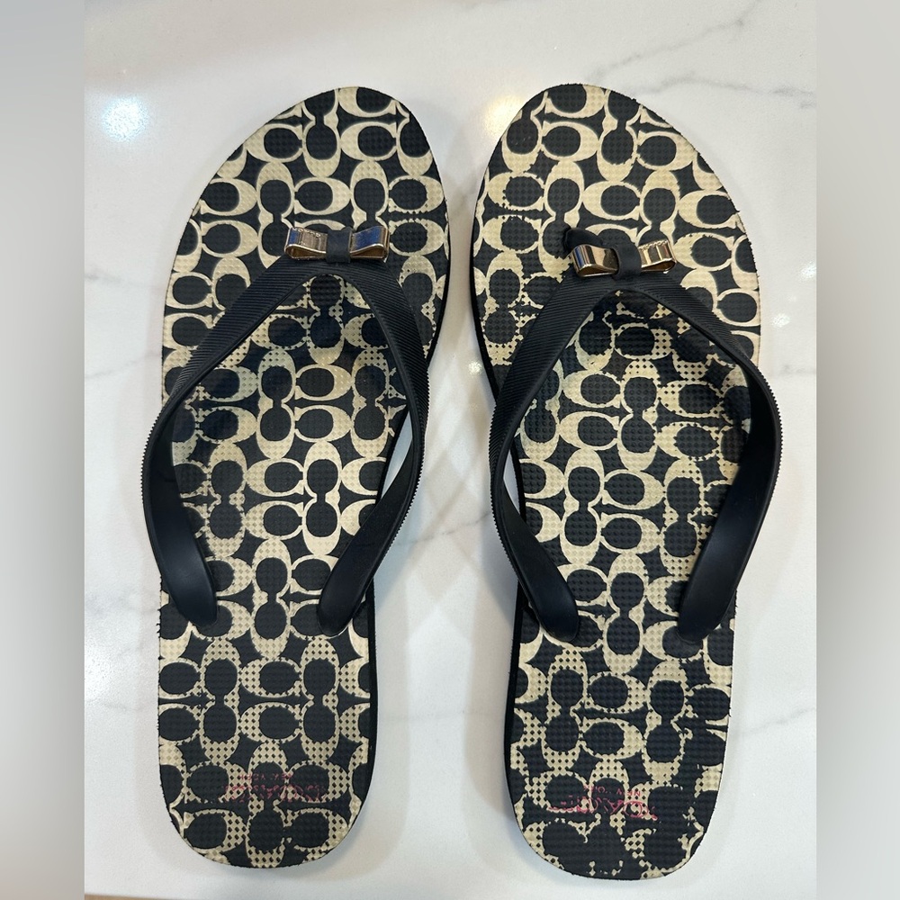 Women’s Coach flip flops, size 7